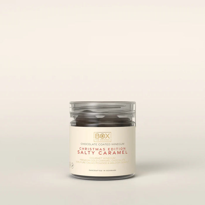 Gourmet julekugle med mango-vingummi og dulce-karamelchokolade – perfekt julegave eller julesnack.