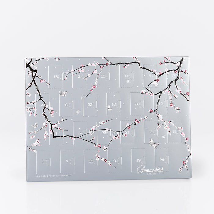 Eksklusiv Summerbird julekalender, der kombinerer mørk og Amber chokolade i fyldte varianter og sæsonfavoritter.