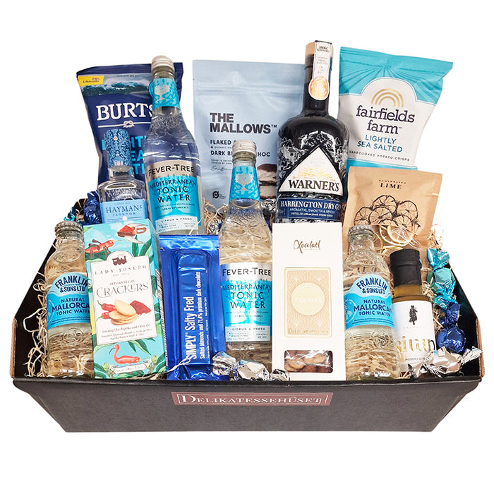 Send en stor lykønskningsgave i form af denne overdådige gavekurv med gin og tonic