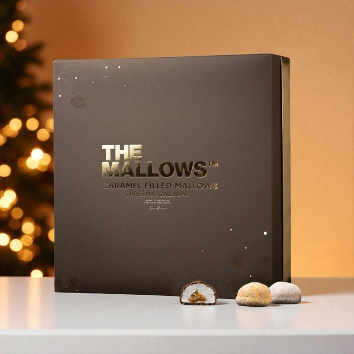 Deluxe julekalender fra The Mallows med 24 låger fyldt med store skumfiduser med flydende karamelfyld og chokoladeovertræk i 12 forskellige varianter.