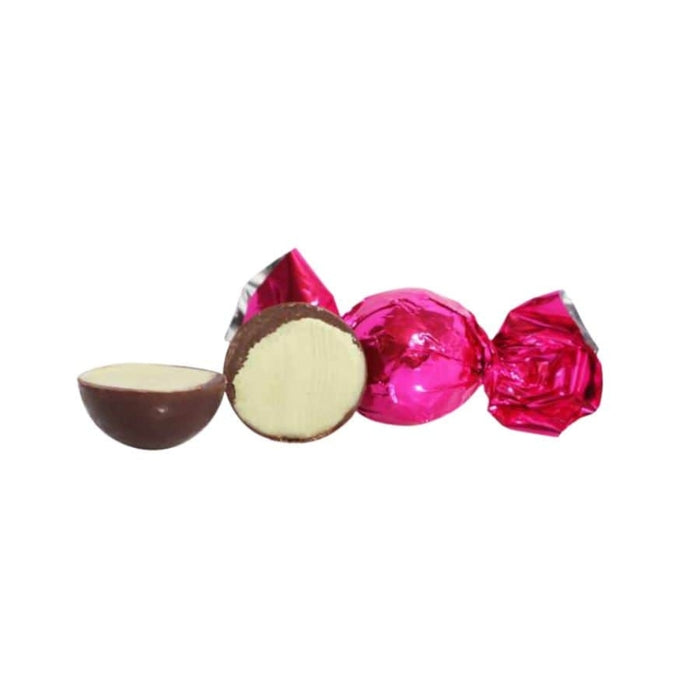 chokoladekugler af mørk chokolade med fyld af creme med smag af pistacie