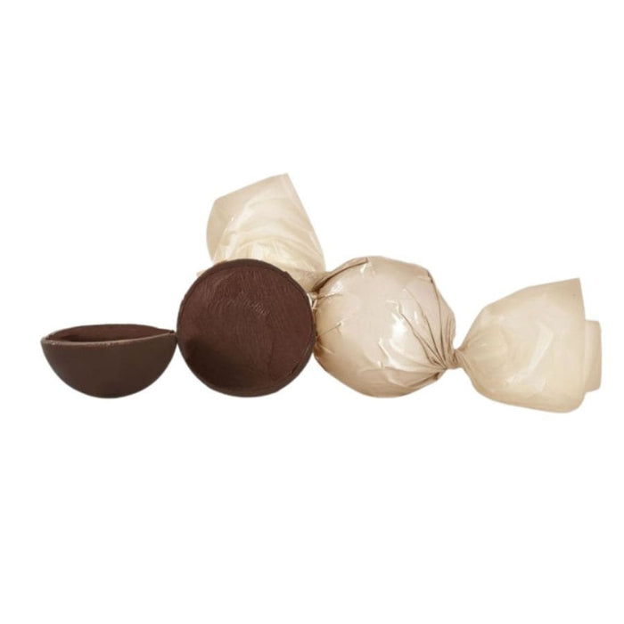 Chokoladekugler af mørk chokolade med kakaocreme, honning