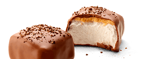 Marshmallows med lys chokolade skåret over på midten