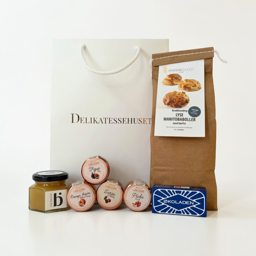 Gavepose med boller, honning, marmelade og pålægschokolade
