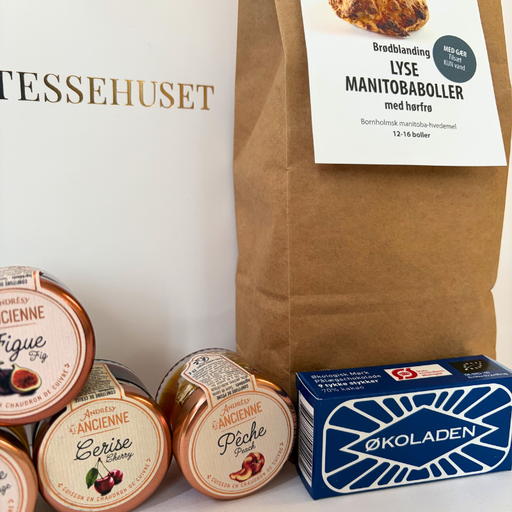 Gavepose med boller, honning, marmelade og pålægschokolade