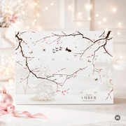 Summerbird Amber julekalender med 24 låger fyldt med chokoladebarer, fyldte chokolader, trøfler og dragéer lavet af den ikoniske Amber chokolade