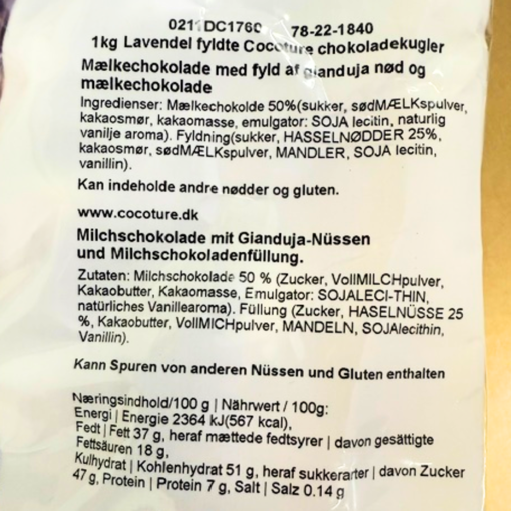 Varedeklaration for Cocoture lavendelfyldte chokoladekugler af mælkechokolade med gianduja nøddefyld.