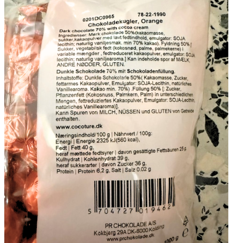 Bagside af pose med Cocoture chokoladekugler orange med ingrediensliste og næringsindhold.