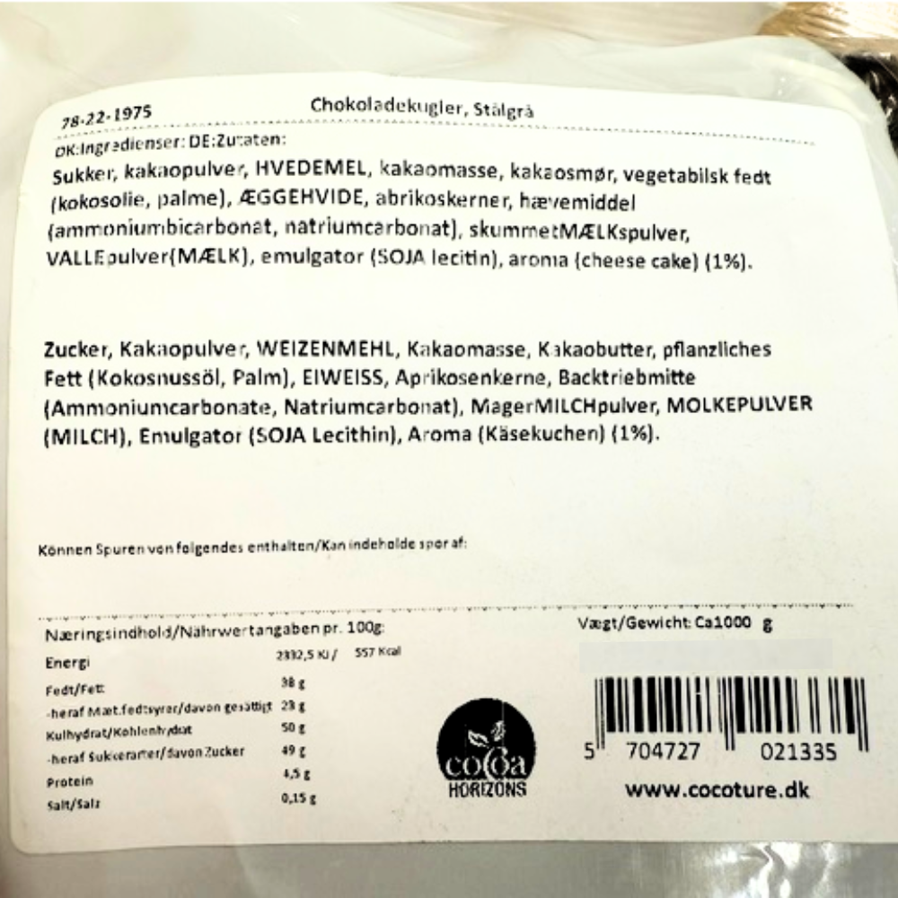 Ingrediensliste og næringsindhold for stålgrå chokoladekugler med cheesecake smag fra Cocoture.