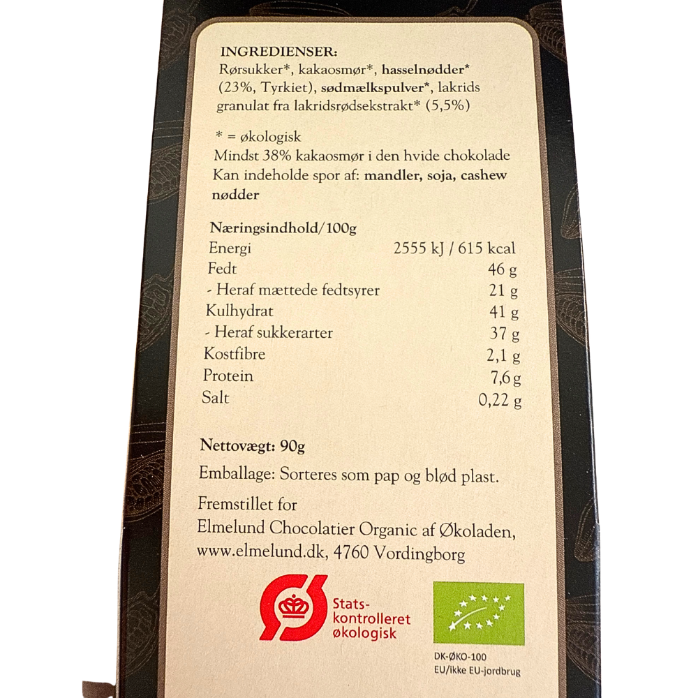 Næringsindhold og ingrediensliste for Elmelund dragé hasselnødder med hvid chokolade og lakrids.