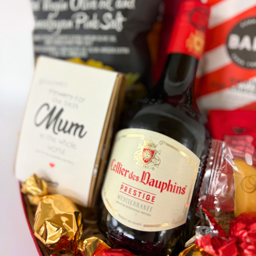 Gaveæske med søde sager, rødvin og blomsterfrø til mors dag