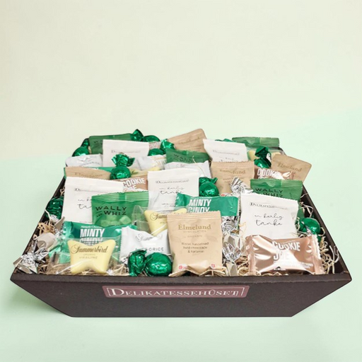 Grøn delevenlig gave, fyldt med chokolade