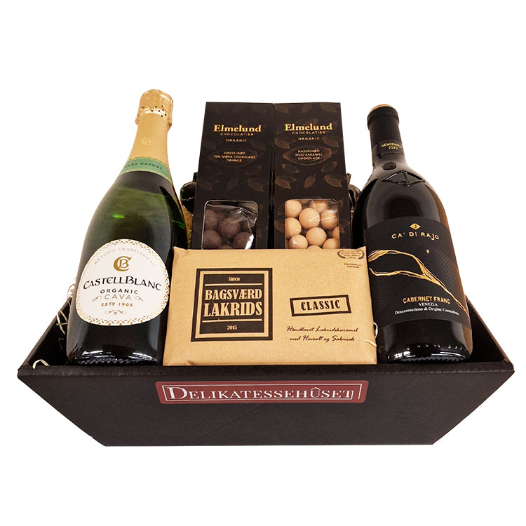 Eksklusiv gavekurv med Cava, rødvin, Bagsværd Lakrids og Elmelund chokolade til enhver anledning.