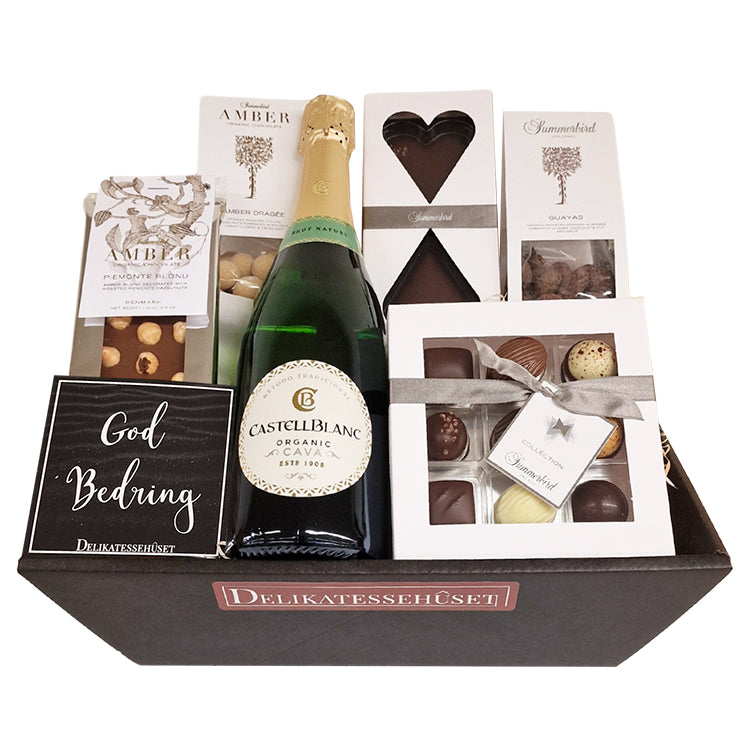 Luksuriøs god bedring gavekurv med økologisk Castellblanc Cava og chokolade fra Summerbird.