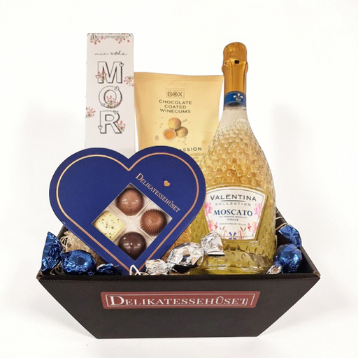 Flot og blå gavekurv med søde bobler, chokolade, lakrids og vingummi til verdens bedste mor