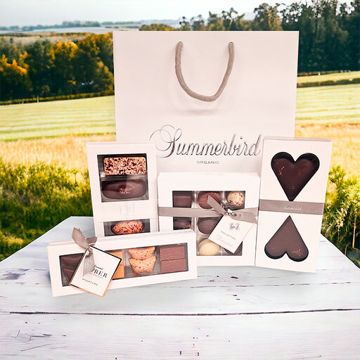 Gavepose med chokolade fra Summerbird. Gaveposen indeholder 4 gaveæsker med dansk luksus chokolade