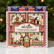 Gourmet popcorn julekalender – eventyrlig julebog med 24 låger, der gemmer 19 unikke smagsvarianter, inkl. klassikere, julesmage og limited editions.	