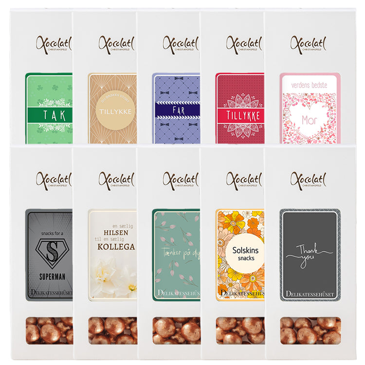 Forskellige Xocolatl lakridskugler med personlige hilsner som Tak Tillykke Mor og Far.