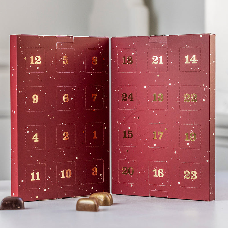 Julekalender fra Xocolatl med 24 stykker fyldt chokolade. Bestil online ved Delikatessehuset