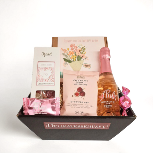 Gavekurv med mousserend vin. vingummi og blomsterfrø til verdens bedste mor til mors dag