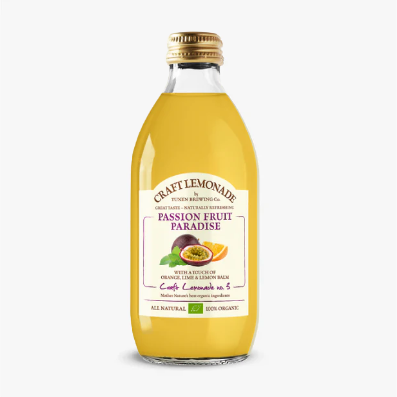 Flaske med økologisk Tuxen Craft Lemonade Passion Fruit Paradise med smag af passionsfrugt og citrus.