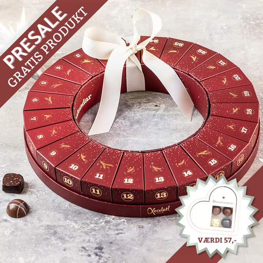 Julekrans-julekalender fra Xocolatl – 24 æsker samlet i en smuk krans, hver med to fyldte danske chokolader med bl.a. karamel, ganache og nougat.	