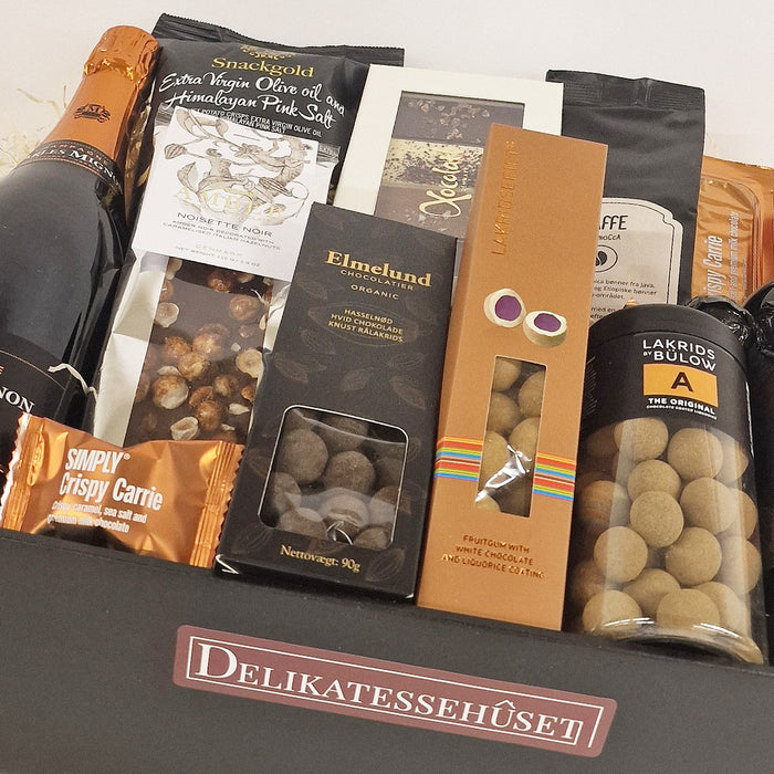 Gavekurv - overdådig Champagnekurv med champagne, kaffe, chokolade og lækkerier