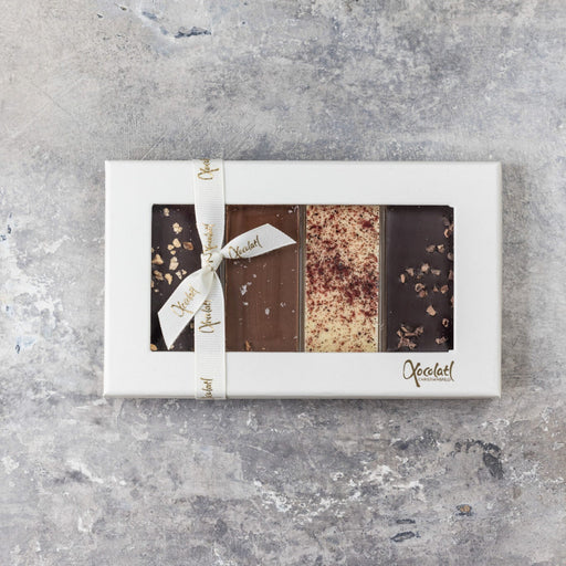 Gaveæske med chokolade med fire forskellige slags chokolade