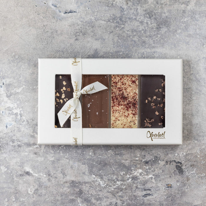 Gaveæske med chokolade med fire forskellige slags chokolade