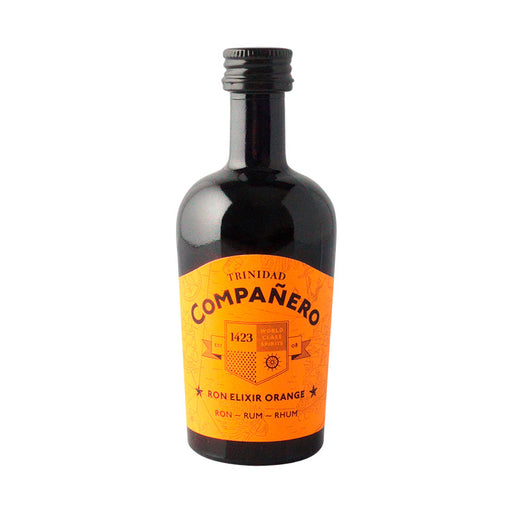 En lille flaske Compañero Elixir Orange, perfekt til smagsprøvning eller til deling.